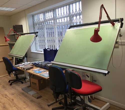 Image of construction plans in office